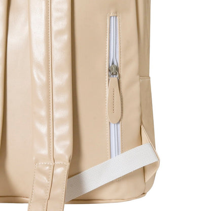 Close-up of a beige backpack with a zipper and strap on a white background