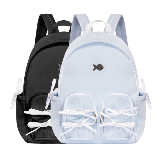 Two backpacks, one black and one light blue with white accents, on a white background.