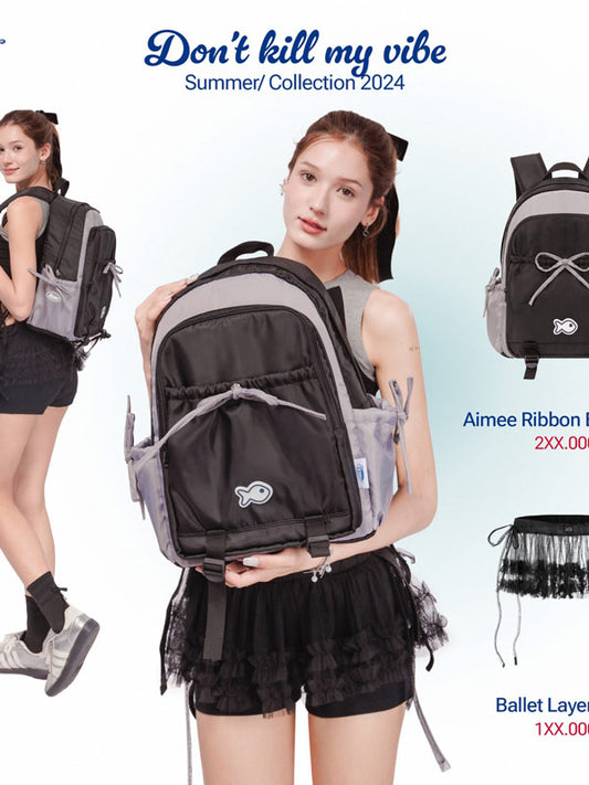 Woman holding a black backpack with promotional text for 'Don't kill my vibe' Summer Collection 2024.