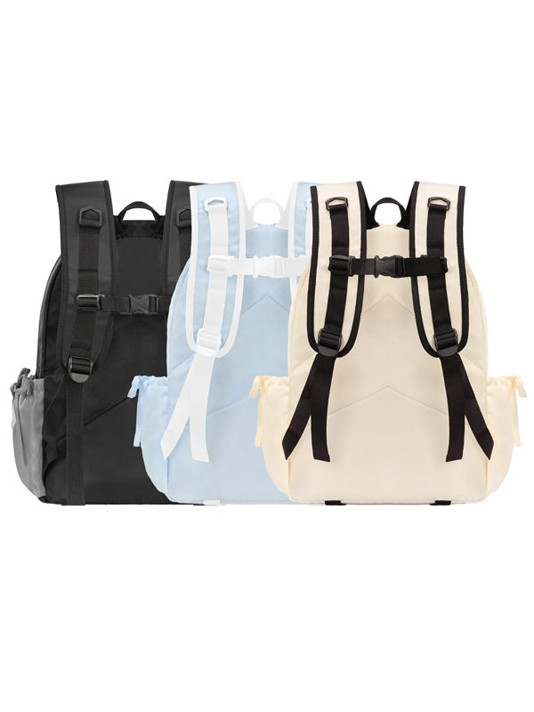 Three backpacks in black, light blue, and beige on a white background
