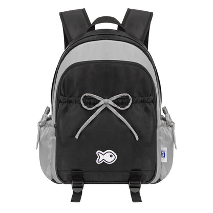 Gray and black backpack with a bow design on a white background