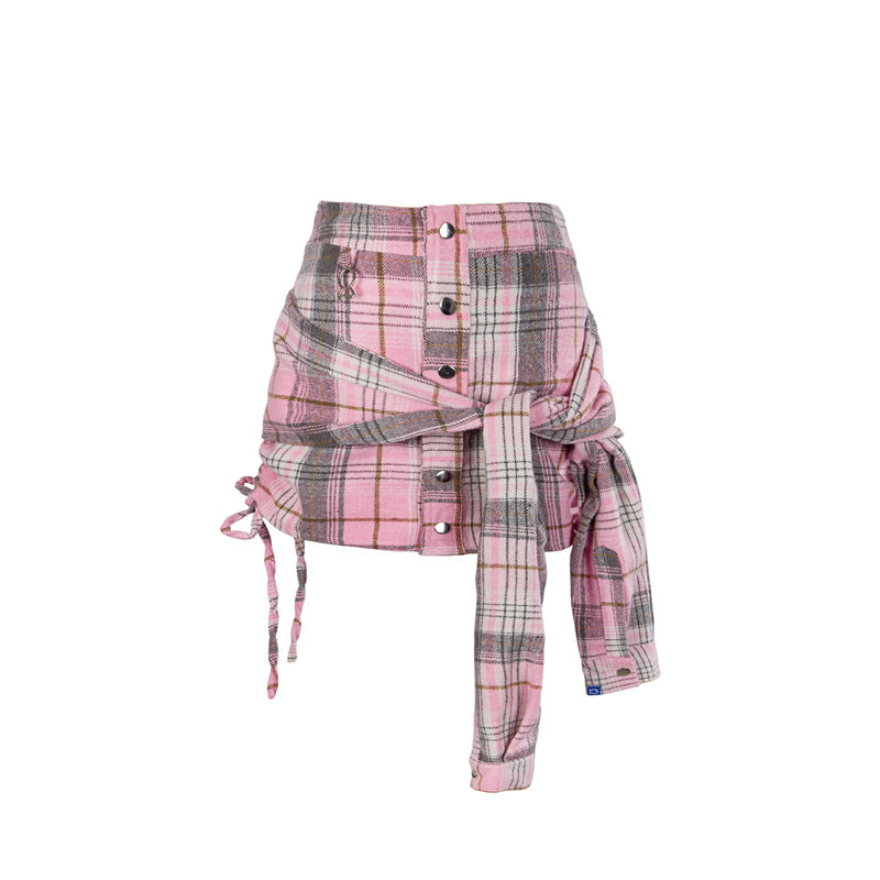 Pink plaid skirt with buttons on a white background