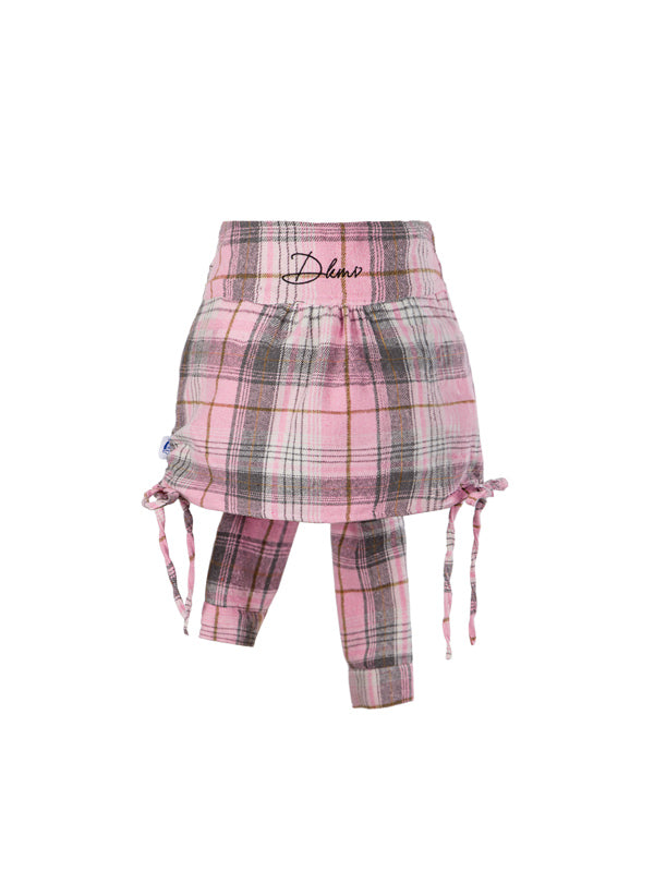 Pink plaid skirt and leggings set on a white background
