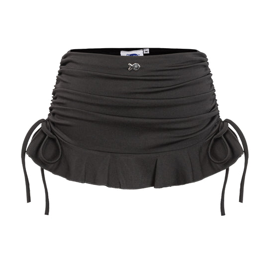 Black skirt with ruched design and tied waist on a white background