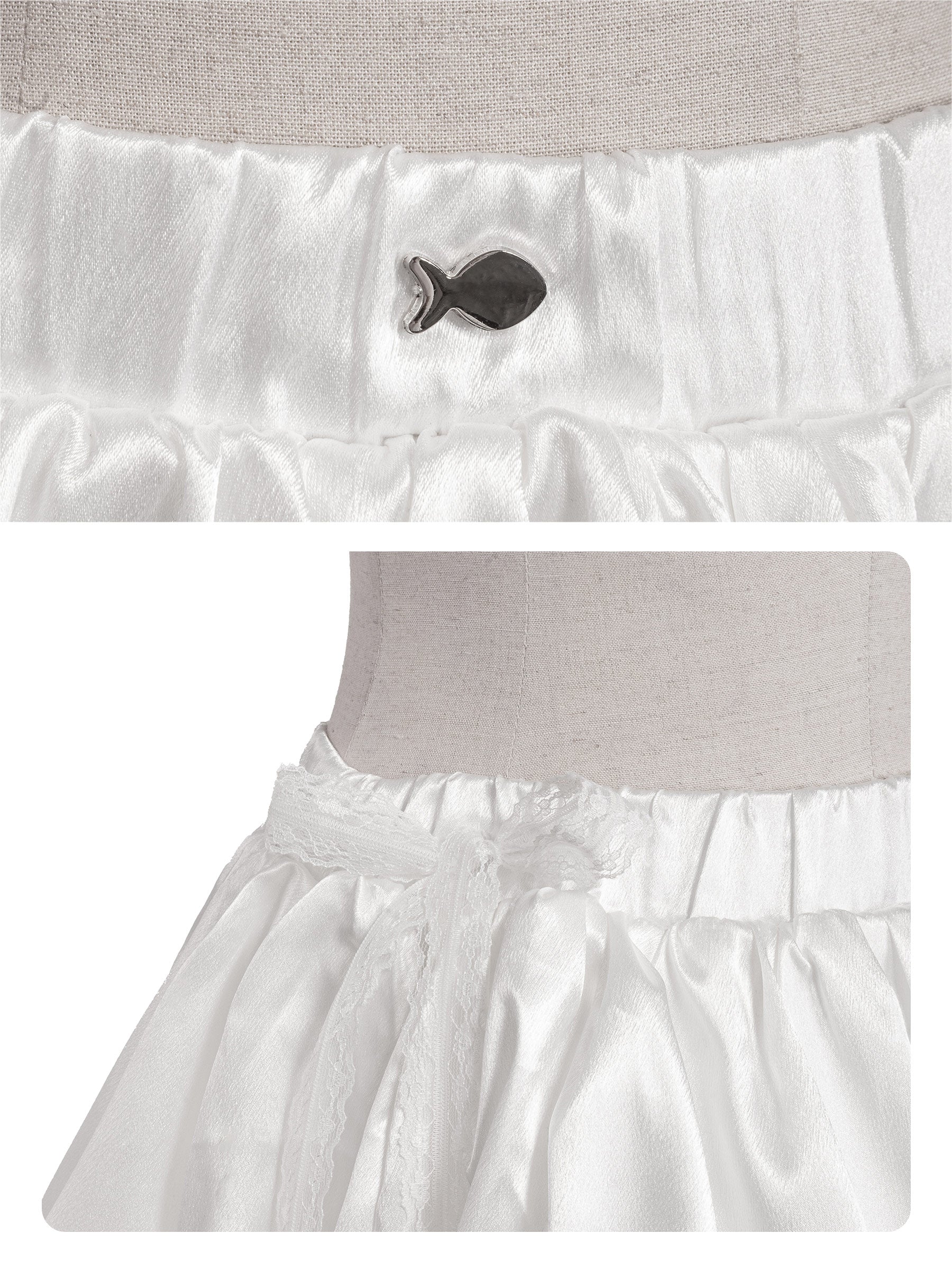 White ruffled petticoat with a button detail on a light gray background