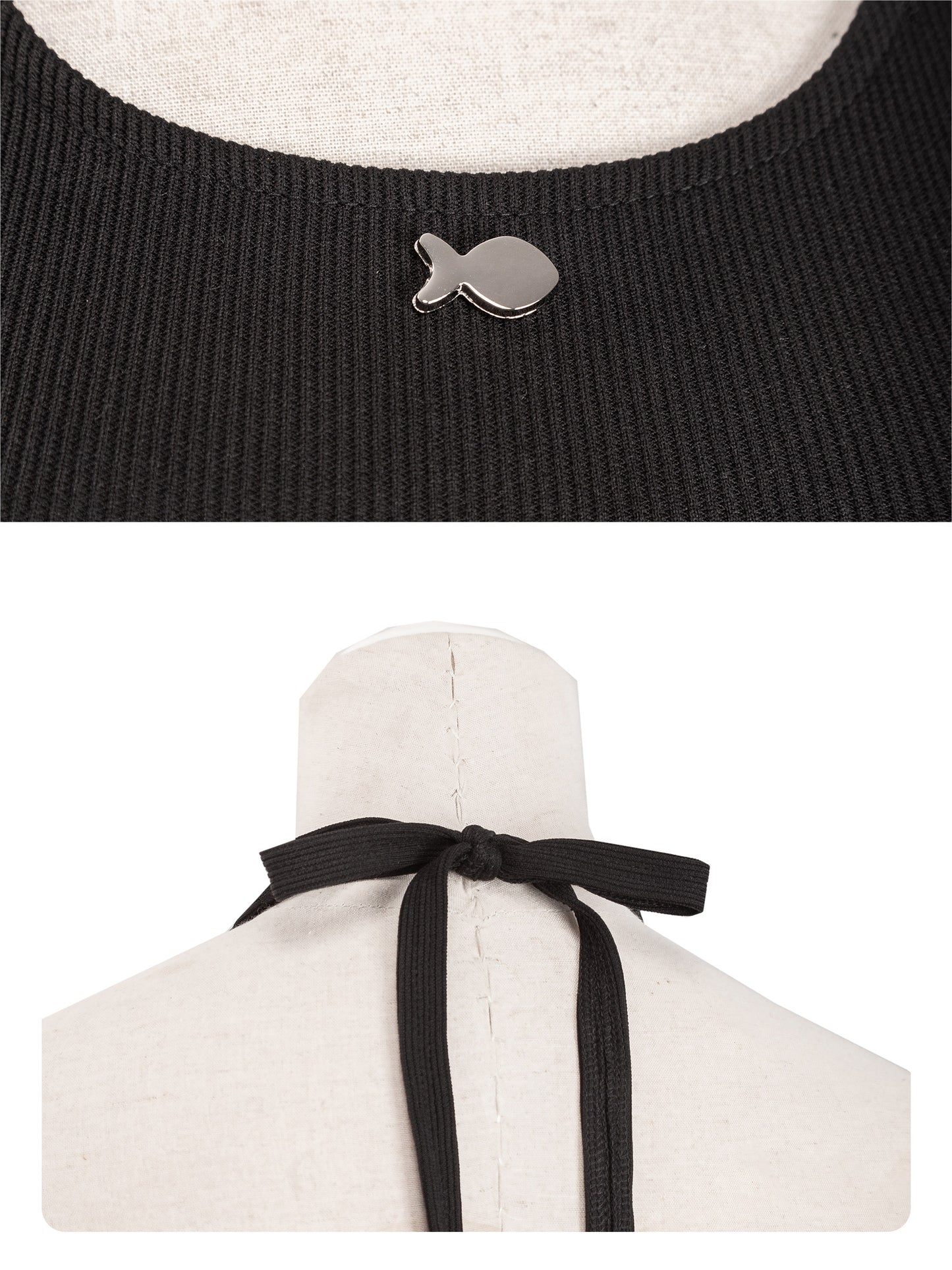 Black sweater with fish-shaped button and white garment with black ribbon on a mannequin.