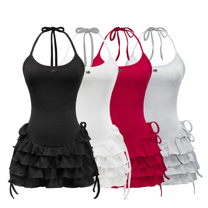 Black, white, red, and gray halter dresses with ruffled skirts on a white background