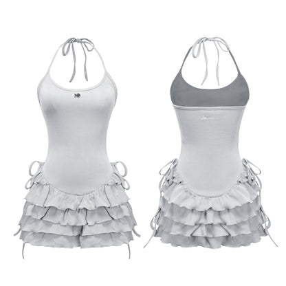 Gray tank top with ruffled skirt on a white background