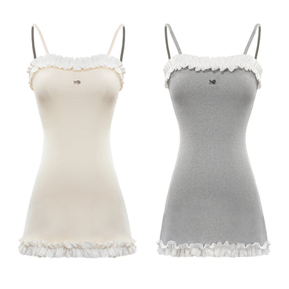 Two camisoles, one beige and one gray, with lace trim on a white background.