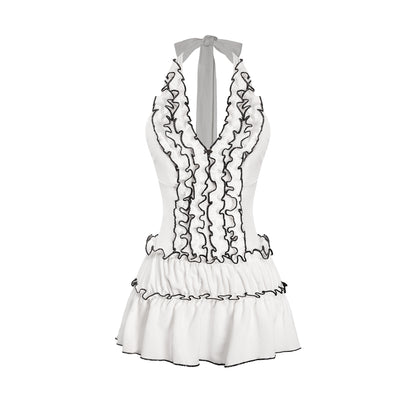 White lace dress with black details on a white background