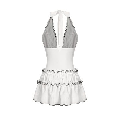 White and gray dress with ruffled skirt on a white background