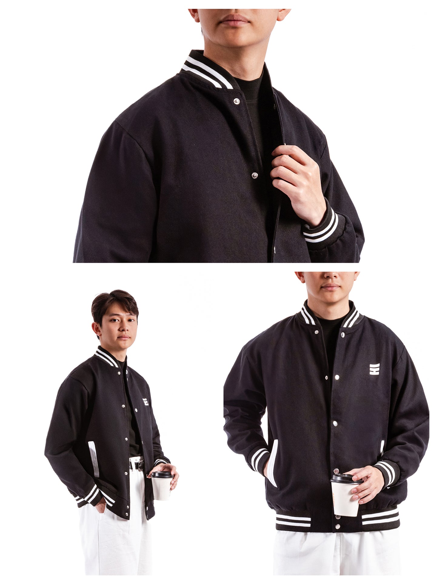 Black varsity jacket with white accents worn by a person on a white background