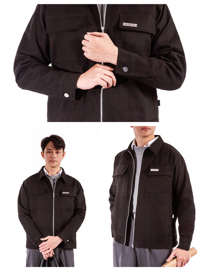 Black jacket with a brand logo worn by a person on a white background