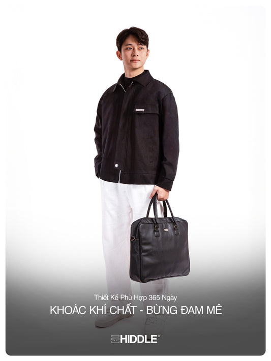 Man holding a black briefcase against a white background with Hiddle branding.