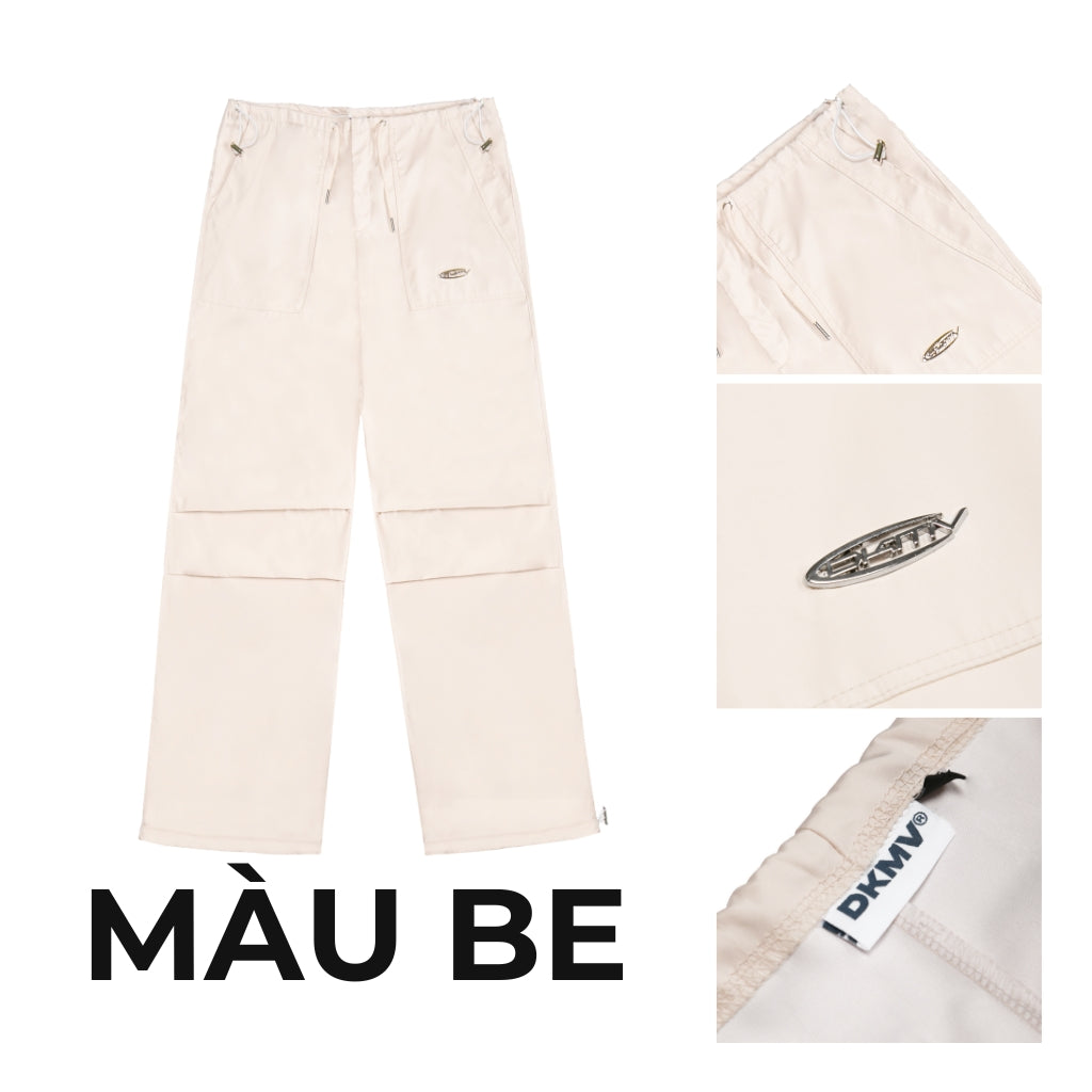 Beige pants with a brand label on a white background