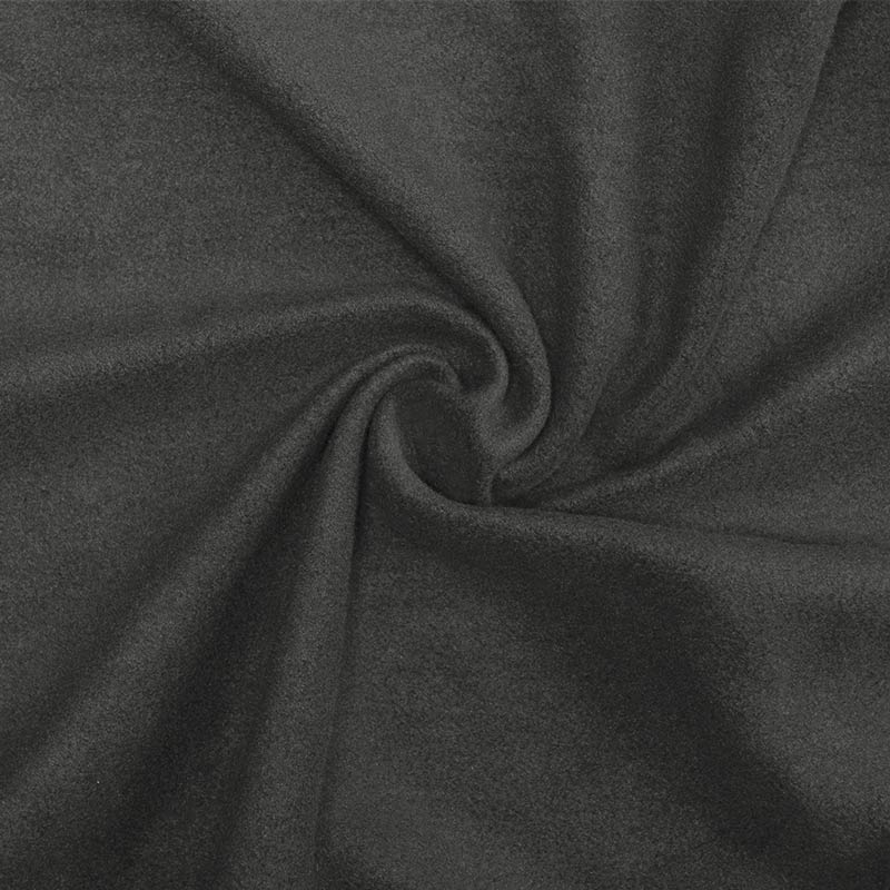 Close-up of dark gray fabric with folds