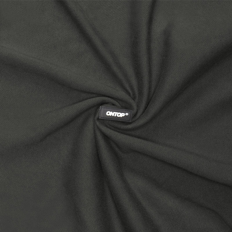 Black fabric with a visible brand label in the center