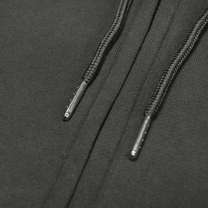 Close-up of black shoelaces on a dark fabric background