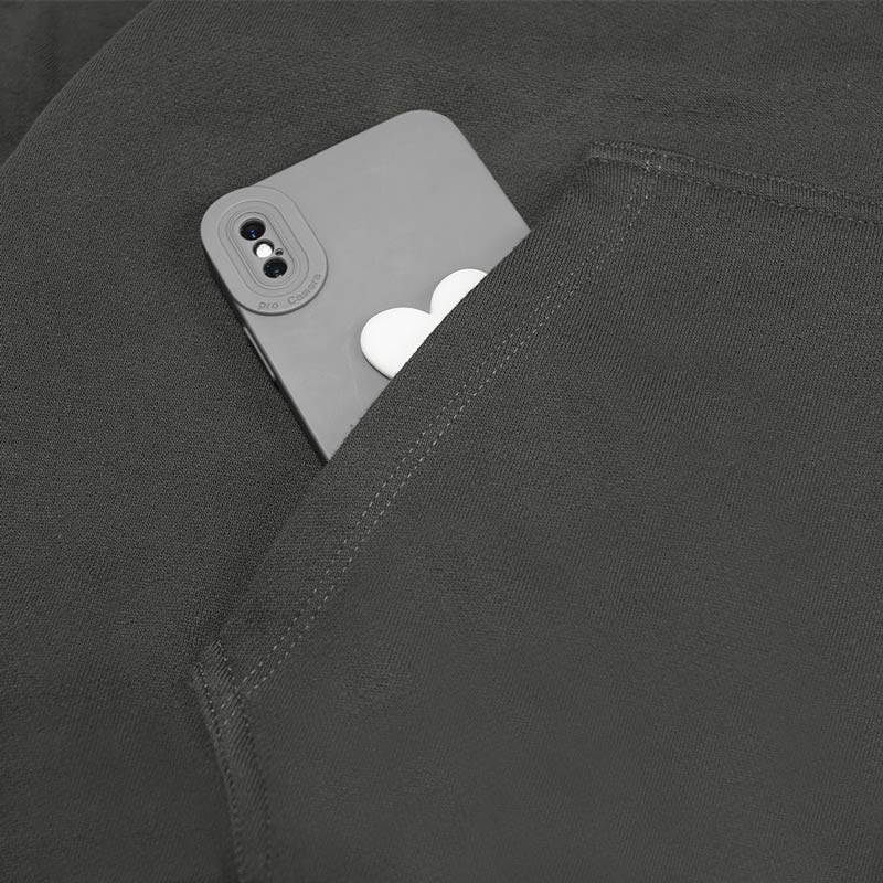 Gray phone case with Apple logo in a black pocket