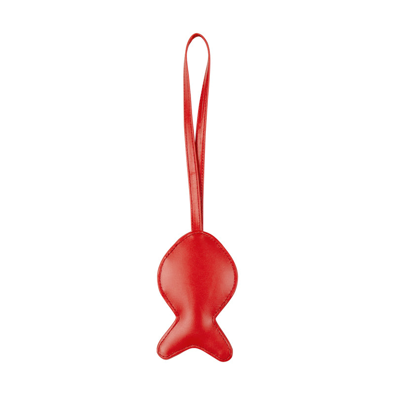 Red fish-shaped object with a handle on a white background