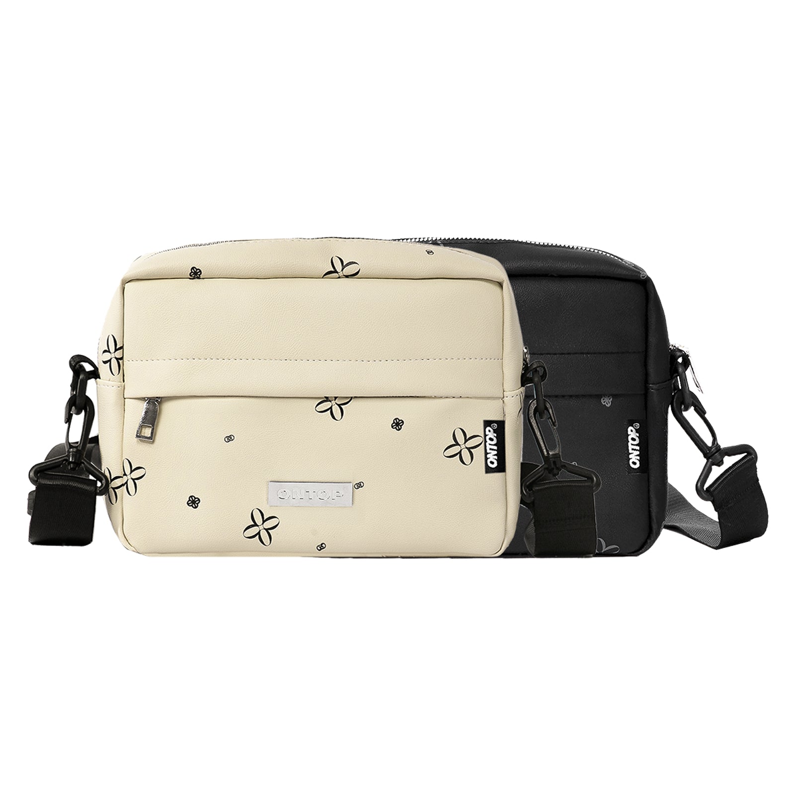Two-tone beige and black bag with floral patterns on a white background