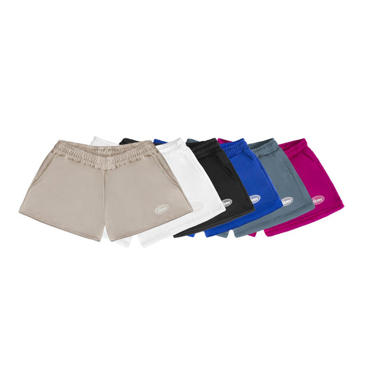 Set of beige shorts with additional pairs in various colors on a white background