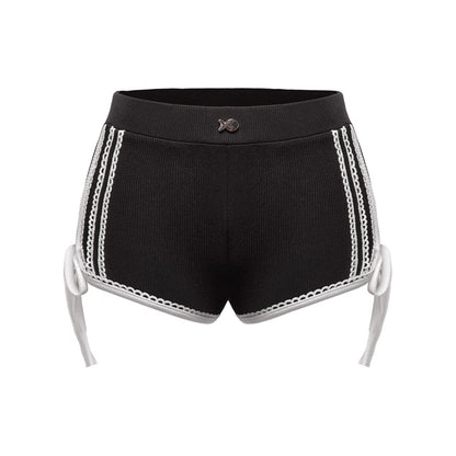 Black shorts with white lace trim on a white background