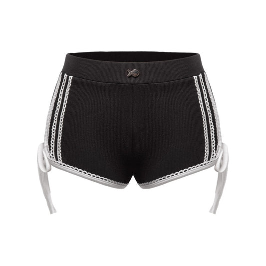 Black shorts with white lace trim on a white background