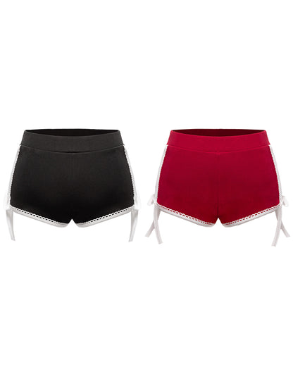 Black and red shorts with lace trim on a white background