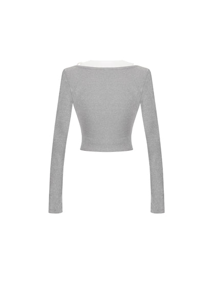 Gray long-sleeve crop top on a white background