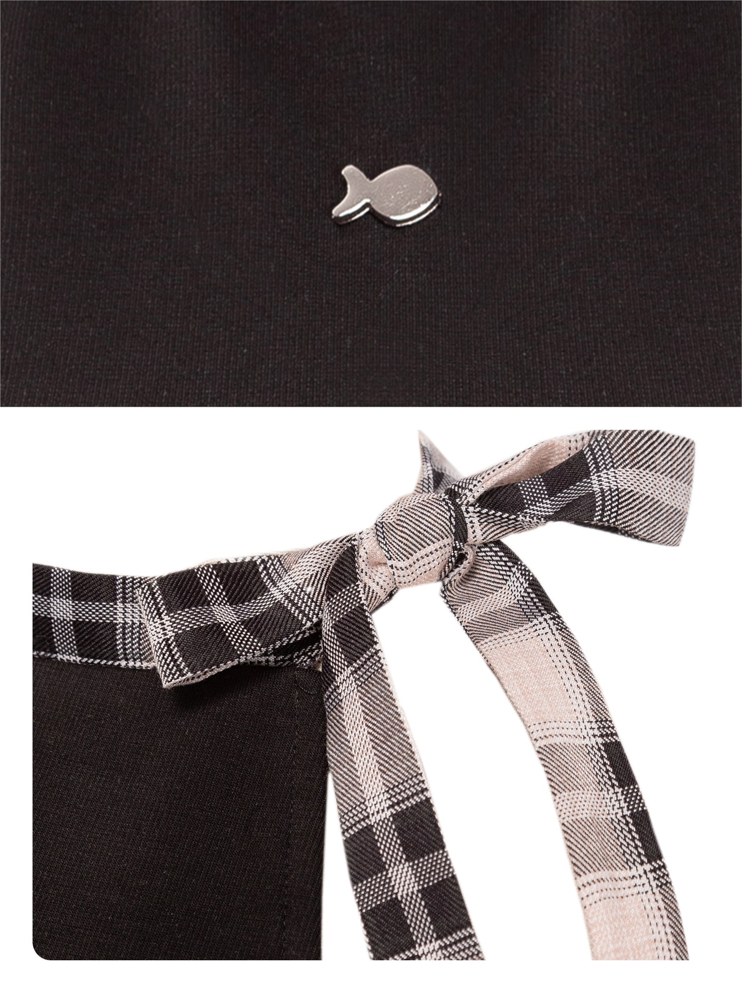 Black bag with a fish-shaped clasp and plaid ribbon on a white background