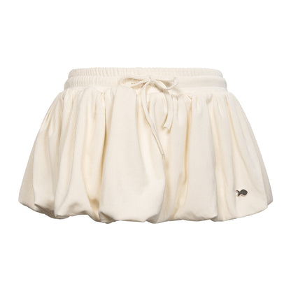 White skirt with a tie waist on a white background
