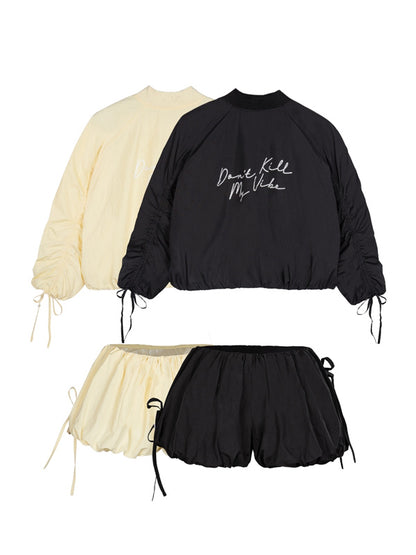 Black and beige outfit with text on a white background