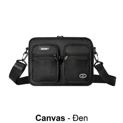 Black crossbody bag with visible brand logo on a white background