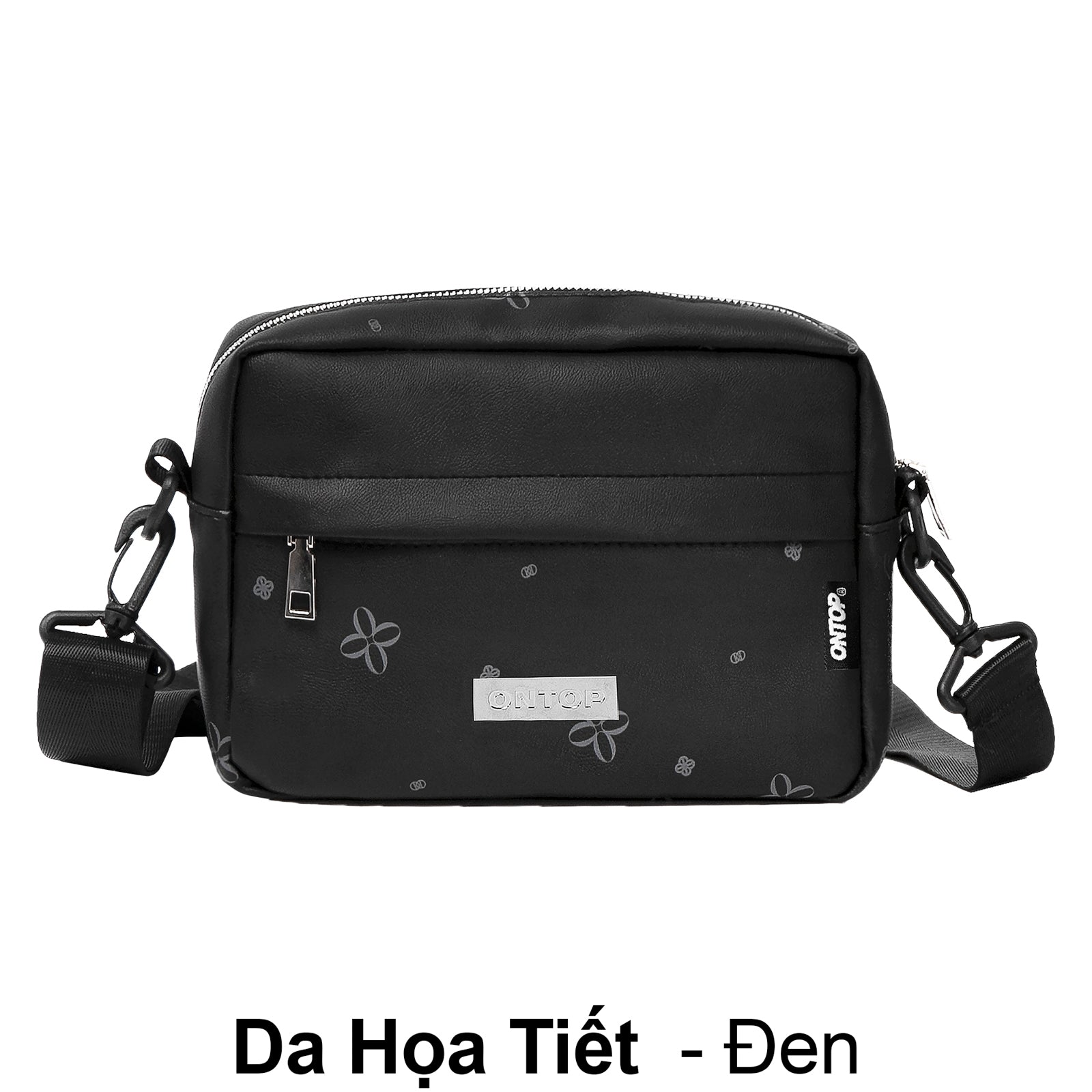 Black shoulder bag with floral patterns on a white background