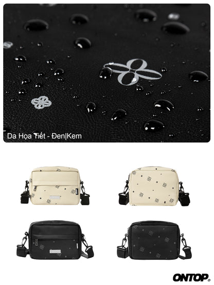 Black surface with water droplets and a brand logo, featuring two beige bags and two black bags below.