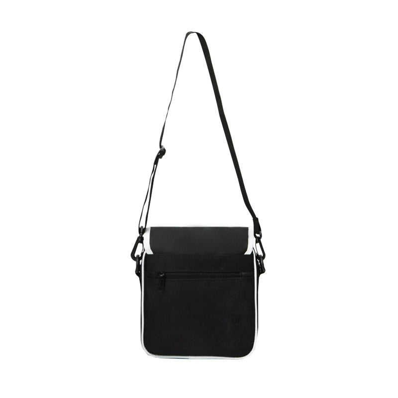 Black crossbody bag with a strap on a white background