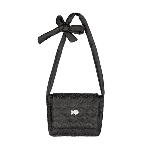 Black quilted handbag with a bow on a white background