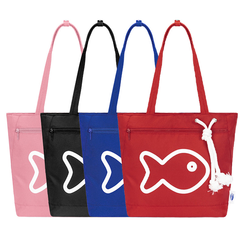 Four tote bags in different colors with fish designs on a white background