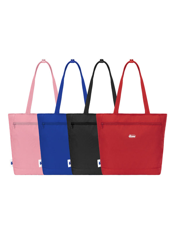 Four tote bags in pink, blue, black, and red on a white background