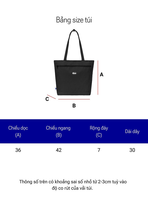 Black tote bag with measurement chart on a white background
