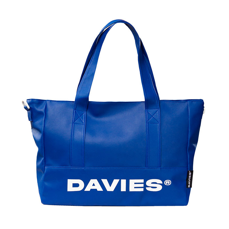 Blue tote bag with 'DAVIES' branding on a white background