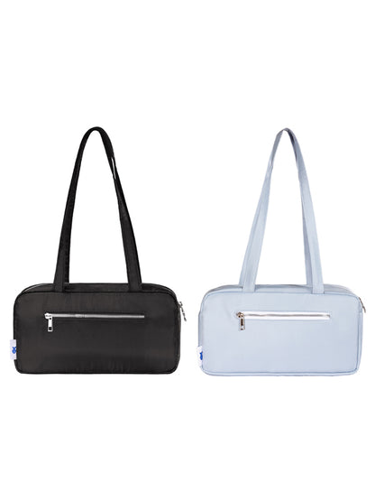 Black and light blue handbags on a white background