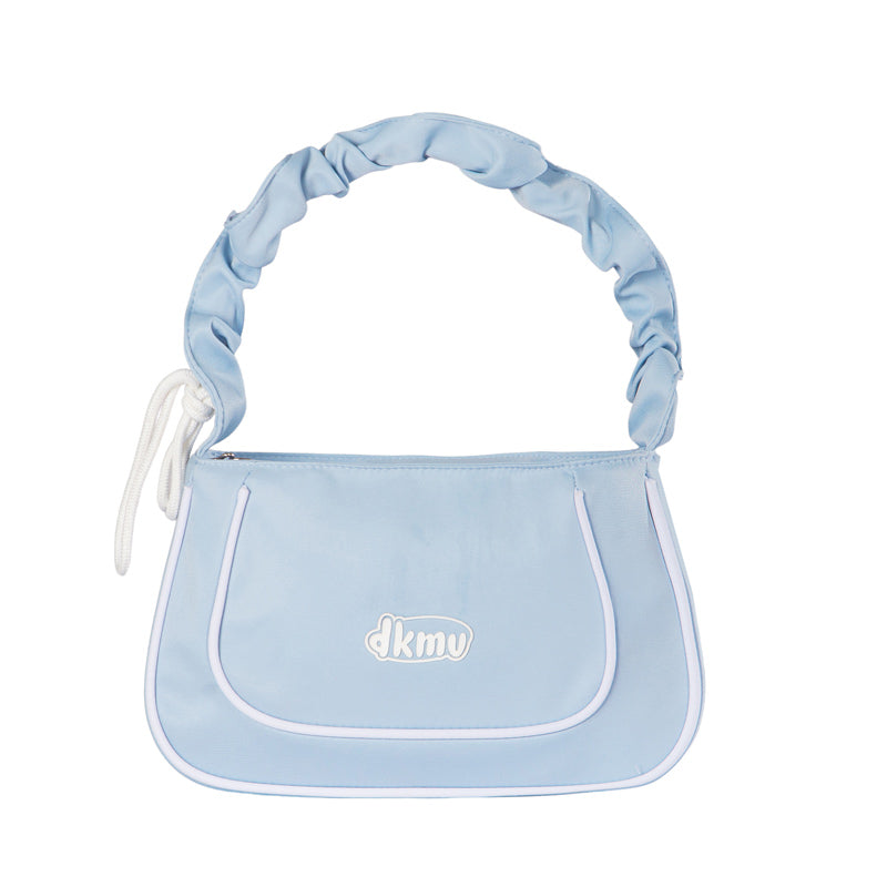 Light blue baby carrier with 'dkmy' branding on a white background