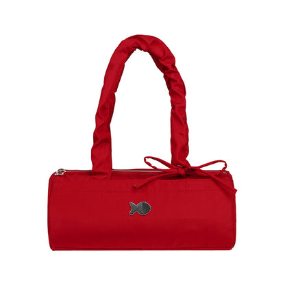 Red handbag with a bow on a white background