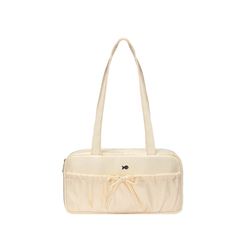 Beige handbag with a bow on a white background