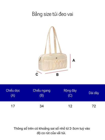 Measurement chart for a shoulder bag with dimensions labeled.