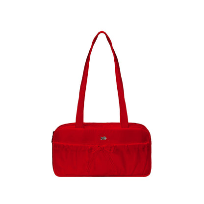 Red handbag on a white background