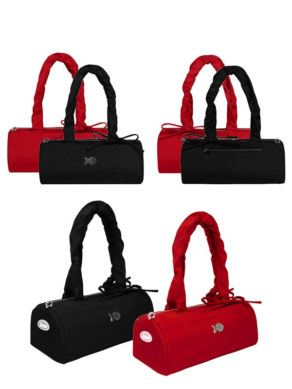 Four views of a black and red dog carrier on a white background