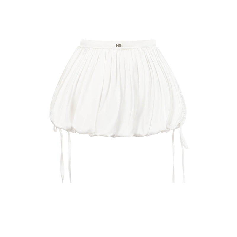 White pleated skirt on a white background